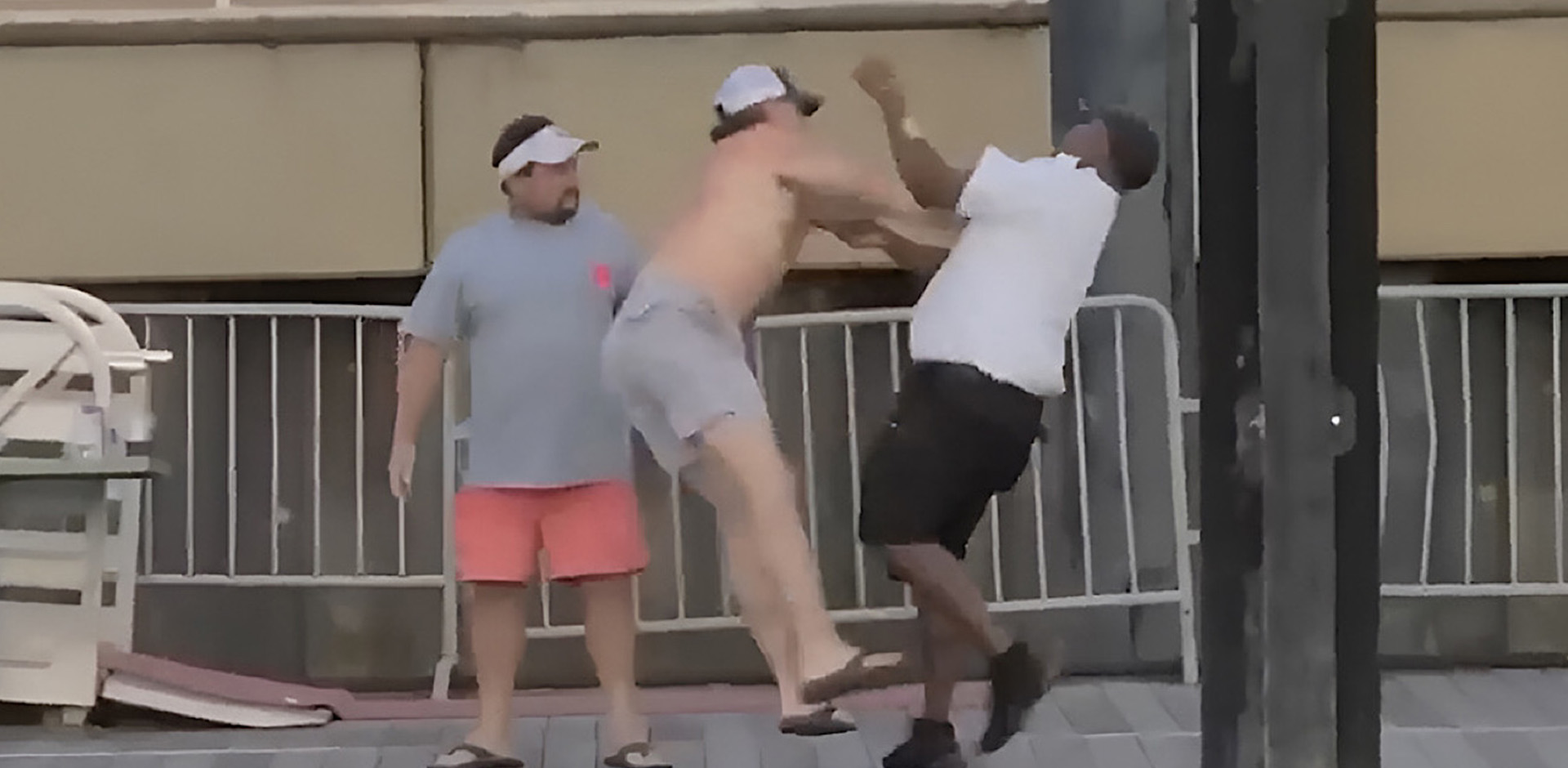 Some of people fighting on the boat dock