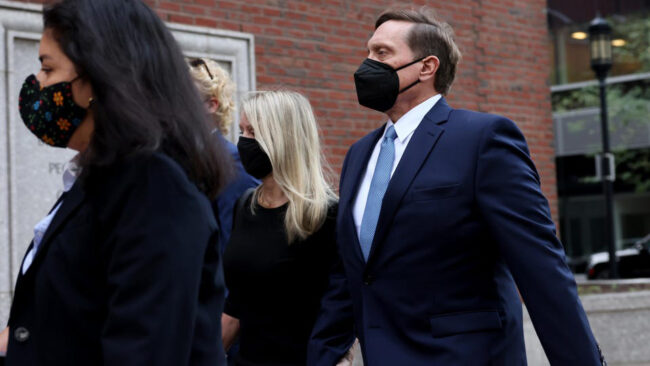 Lawyers on the way to court for fraud case