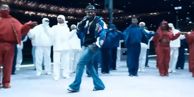 Kendrick Lamar looks at the camera and says "Hey Drake"