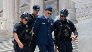 Air Force Major Charged Under Rare Military Law After Calling for Trump’s Impeachment
