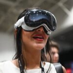 The Apple Vision Pro headset; Apple has cut roughly 200 jobs across its Vision Pro and Siri teams