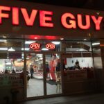 A Five Guys restaurant storefront; a 19-year-old was critically wounded in a shooting at a Five Guys in Oxnard, California