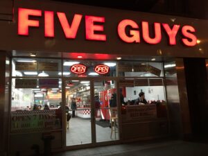 A Five Guys restaurant storefront; a 19-year-old was critically wounded in a shooting at a Five Guys in Oxnard, California