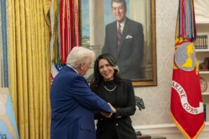 President Trump with then-Director of National Intelligence Tulsi Gabbard, who reportedly warned him against striking Iran's leadership before the February offensive