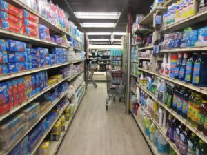 A grocery store aisle; food-at-home prices are up roughly 25% over the past five years, and most Americans now cite groceries as their biggest cost-of-living pressure