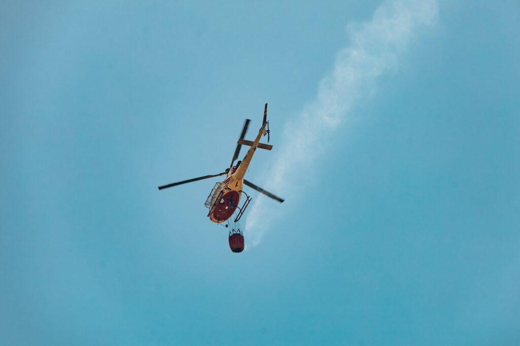Two firefighting helicopters collide while battling wildfire in Greece