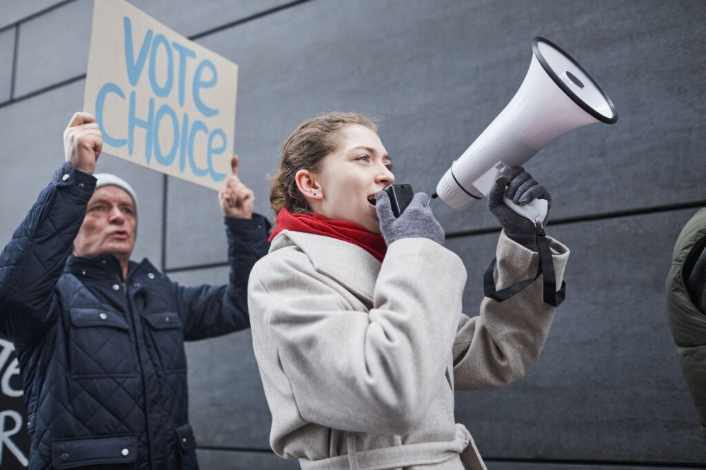 Progressive activist wins Democratic primary in one of the country’s biggest House races