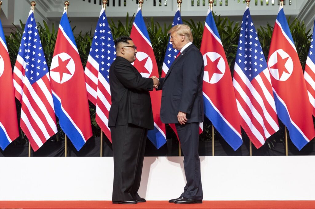 Trump and Kim Jong Un at their 2018 Singapore summit; Trump is reportedly pushing for another meeting with Kim this fall, though North Korea has not agreed