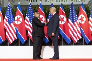 Trump and Kim Jong Un at their 2018 Singapore summit; Trump is reportedly pushing for another meeting with Kim this fall, though North Korea has not agreed