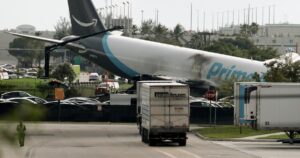 Amazon-branded cargo plane overruns runway at Miami airport, strikes multiple vehicles