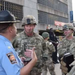 Georgia National Guard Member Charged With Assault After Allegedly Drawing Gun on Fellow Guardsman Over Haircut Dispute in D.C.