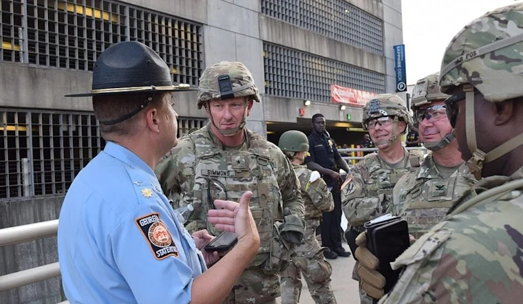 Georgia National Guard Member Charged With Assault After Allegedly Drawing Gun on Fellow Guardsman Over Haircut Dispute in D.C.