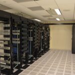 Rows of server racks inside a data center