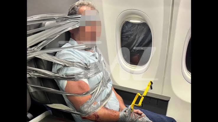 Passengers Duct-Tape Unruly Man to His Seat After Racist Outburst and Attacks on American Airlines Flight