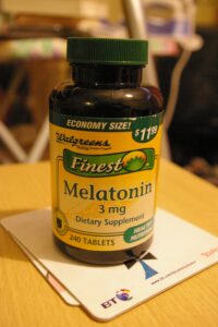 A bottle of over-the-counter melatonin supplements