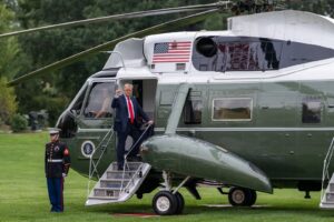 President Trump speaks to the press before boarding Marine One en route to Joint Base Andrews